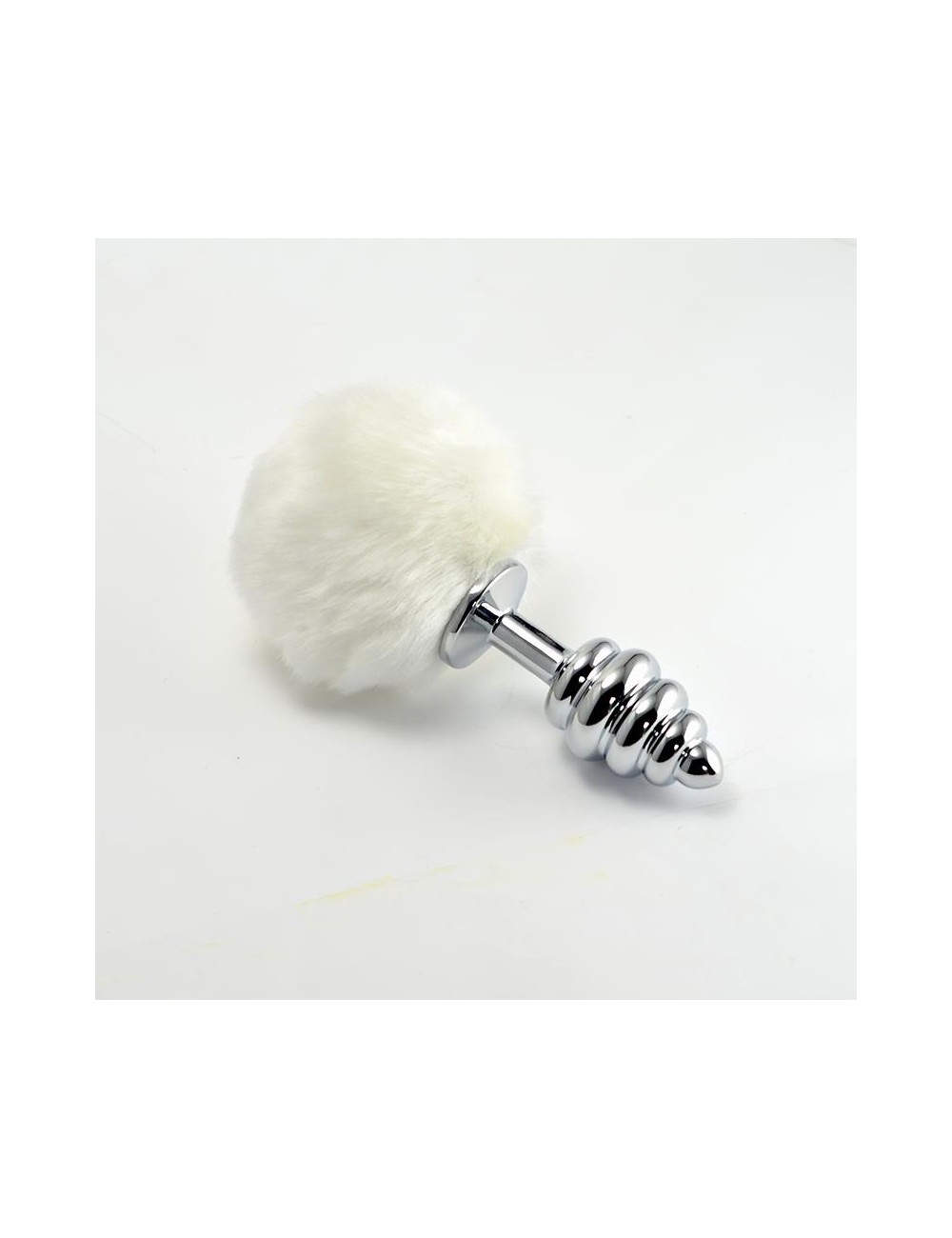 Plug Anal de Metal en Espiral con Pompon Blanco